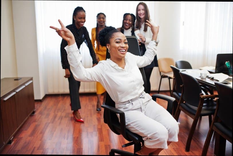 Staff celebrating during an office gathering.
